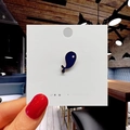 Close-up of cute navy blue fish enamel stud earring on a white jewelry display card - 7*Little Blue Whale Pin