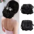 Detail view of black curly synthetic hair bun with side combs and floral hair accessory - 1# (Jet Black)