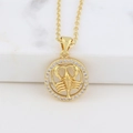 Detailed view of Scorpio pendant necklace in gold with shimmering cubic zirconia accents - Cancer
