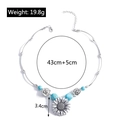 Dettaglio della collana girasole con perle turchesi e incisioni con motivi vichinghi - YN516/Ciondolo Girasole