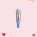 Detail of blue makeup brush with rose gold ferrule and grey slanted sponge tip - Single Pack / Rose Gold Tube + Blue Slanted Head