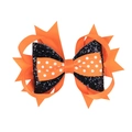 Close-up of Halloween layered bow hair clip with orange polka dots and black glitter ribbon - Orange