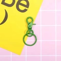Detail of grass green metal lobster clasp with swivel ring for DIY bag accessories - Green