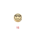 Detailed view of a gold stainless steel round bead with a laser-engraved smiley face - Expression 15