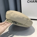 Detail of beige cotton beret featuring a side leather strap with a metallic buckle clasp - M (56-58cm) / Khaki