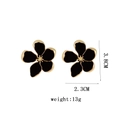 Exaggerated black enamel flower earrings with golden edges and minimalist metal design - Black