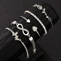 Detail of 5-piece silver bracelet set with butterfly, heart, and crystal charms - Tulip Infinity Butterfly 5-Piece Set / Silver