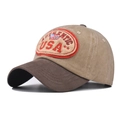 Vista dettagliata di un cappellino da baseball vintage in cotone lavato con ricamo USA - Cachi USA