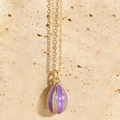 Golden necklace with purple egg-shaped enamel pendant and sparkling rhinestone inlay - Purple