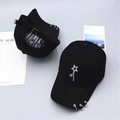 Detail of black baseball cap featuring star metal studs and rings on the brim - [pentacle] Black