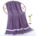 Thick purple cotton bath towel with white stripes draped on a dark rattan chair - Striped Border Bath Towel (Purple) / 70*140cm