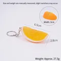 Realistic orange slice PVC keychain in bright orange with high-quality metal ring - Orange Lemon Block - Keychain