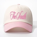 Dettaglio del ricamo rosa The South sul berretto da baseball bicolore crema e rosa - Regolabile / Beige e Rosa