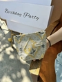 Floral fabric makeup bag in beige and yellow-green being held by a hand - Small / Rhombus Embossed