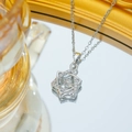 Elegant silver hexagram star necklace with sparkling zircon pendant on mirror reflection - Silver