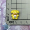 Miniature yellow resin puppy DIY charm for hair clips and phone cases on scale mat - Yellow Standing Dog