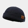 Detail view of the retro canvas brimless sailor cap with DAD embossed leather patch - Adjustable / DAD Patch Dark Grey