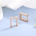 Minimalist gold geometric rectangular hoop earrings displayed on white fabric background - Rose Gold (KE99184-KFC) / Rose Gold
