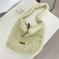 Chic lamb-like faux fur tote bag in grass green with drawstring detail and logo - Green