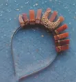 Detail of handmade gold wire-wrapped crown with orange crystals and crescent moon - Gold Headband/Moon/Red Aventurine