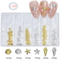 Detailed macro view of 14# gold and silver seashell nail art studs in a 6-grid bag - GZMD-14 Gold Silver Mixed Ocean
