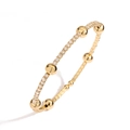 Verstellbares goldfarbenes Kupferarmband mit Zirkonia und Perlen im minimalistischen Stil - Armband (1 Stk) / Gold