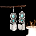 Bohemian silver drop earrings with sky blue stones and hanging feather charms - Sky Blue Turquoise Feather Tassel Style (E4564)