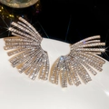 Macro detail of geometric fan earrings with gold-toned metal and crystal pavé stones - Light Gold Radiant Fan Style / Steel Pin-Gold-White