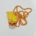 Yellow LED glowing party cup with amber bead necklace for bridal and holiday celebrations - Transparent Orange LED Glow Cup