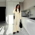 Cream knit set featuring a half-zip sweater and matching wide-leg trousers for women - S / Off White