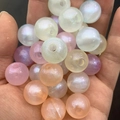 Luminous pearlescent round beads for DIY jewelry making held in palm to show size - 16mm / Mixed Colors (Random)