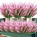 Detailed view of artificial pink lavender bouquet in a window box for garden decor - Pink