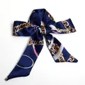 Navy blue silk twilly scarf with gold chain print tied in a decorative bow style - S68-Dark Blue Chain Elegant Style