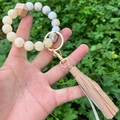 Detail of beaded wristlet keychain with marble pattern beads and brown leather tassel - Light Brown PU Tassel Marble Beaded (款2)