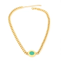 Detail of gold curb chain necklace featuring a green striped circular pendant charm - Green Necklace