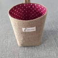 Hanging jute storage bag with red polka dot lining and minimalist Animal Story tag - Red Polka Dots