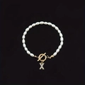 Fashionable white pearl bracelet featuring an oval bead design and a diamond letter X charm - Gold Letter X (SL2013)