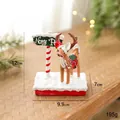 Christmas reindeer figurine with North Pole sign and snow base for festive holiday decor - North Pole Sign Reindeer