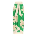 Detail of emerald green wrap skirt with white floral print and a stylish waist tie - One Size / Green Tropical Print Beach Sarong Wrap Skirt