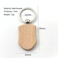 Shield shaped beech wood keychain with 32x79mm dimensions and 7mm thickness - Waist Shape