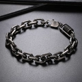 Close-up of industrial style titanium steel chain bracelet with geometric links and spring hook - Vintage Black (KB150812-KLHQ)