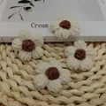 Set of four handmade beige milk cotton crochet flower patches for DIY accessories - Beige