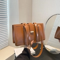 Retro large brown glossy PU leather shoulder bag for women with vintage design - Brown