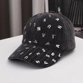 Fashionable black corduroy baseball cap with metallic silver letter rivets in 45-degree view - Adult / Black