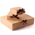 Three-piece kraft paper gift box set with elegant brown ribbon bows and curved lids - Small Gift Box / Brown