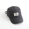 Close-up of deep gray quick-dry camp cap with white square Go logo patch and breathable side vents - 52cm / Gray