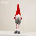Gnome de Noël rouge lumineux avec longues jambes rayées, décor festif de 65cm - Grand Gnome Debout avec Short et Lumière (WZ23-006L)