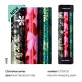 Christmas wrapping paper roll featuring green snowflakes and festive patterns 43cm x 10m - Set 1 (3 Rolls) / 3 Meters Roll