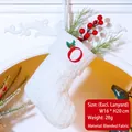 White knitted Christmas stocking with red embroidered letter O and holly leaf detail - Letter O / White