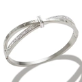 Detail view of silver titanium steel bangle with roman numerals and inlaid crystals - Silver